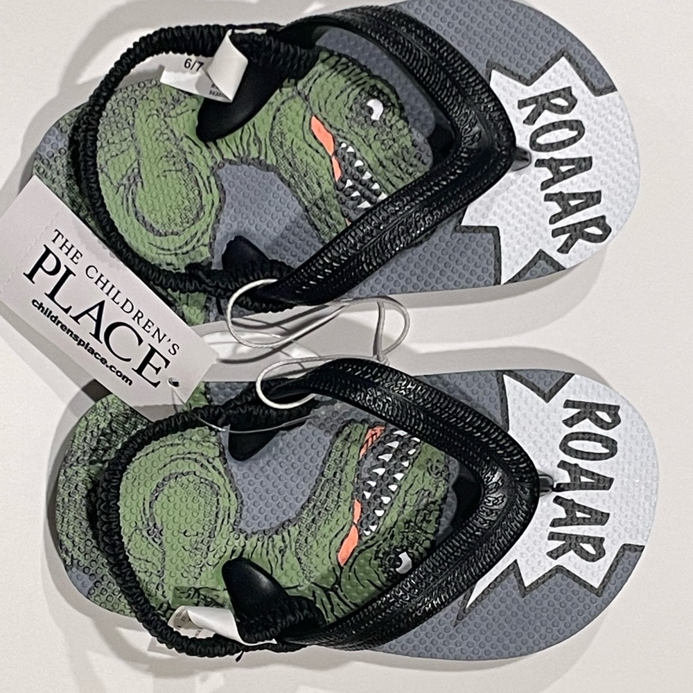 Children’s place dinosaur flip flop kids size 6/7 NWT